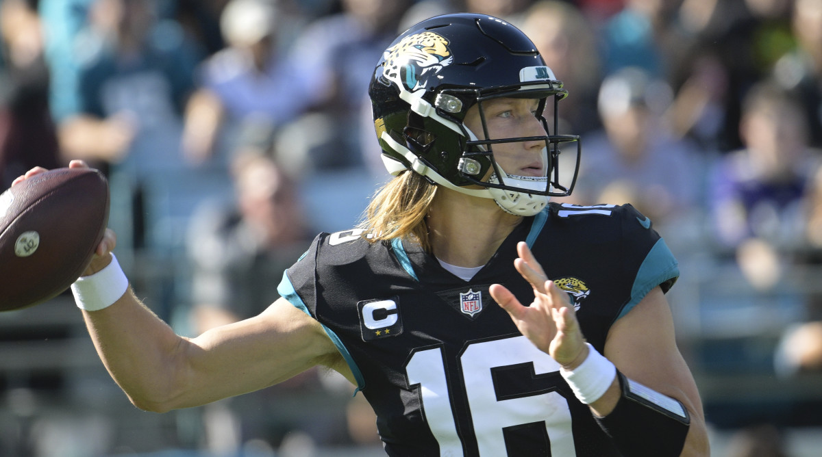 Jacksonville Jaguars quarterback Trevor Lawrence sets back to pass